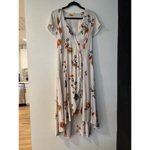 Free People floral midi dress SIZE MEDIUM in a soft cream/ivory base
